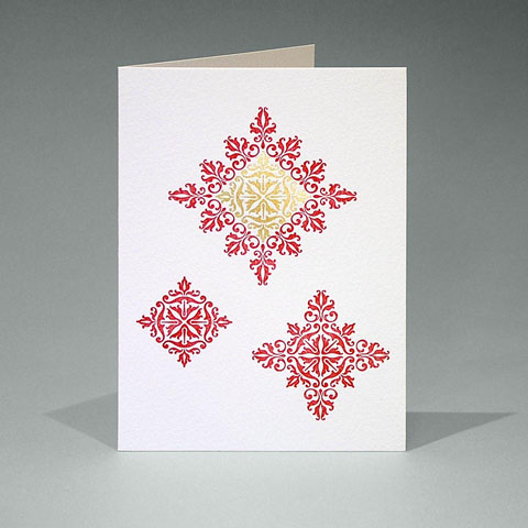 Floral ornament snowflake card in red and gold