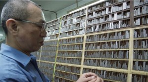 Mr Chang typesetting Chinese metal movable type characters.